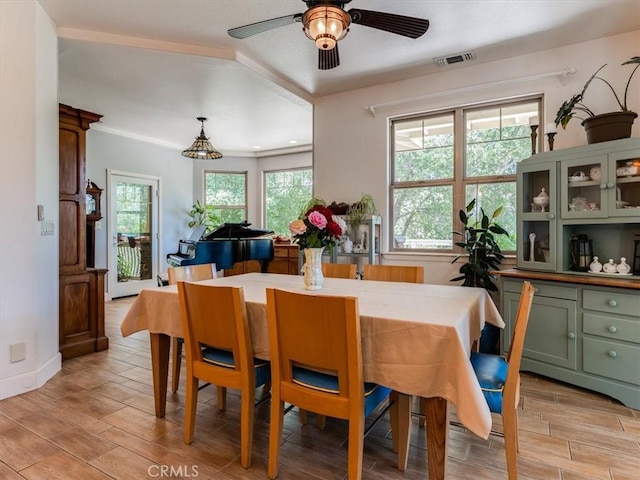 dining room with ceiling fan