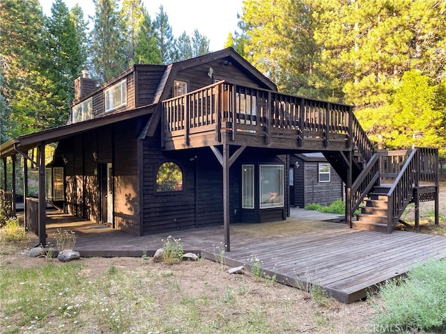 rear view of house with a deck