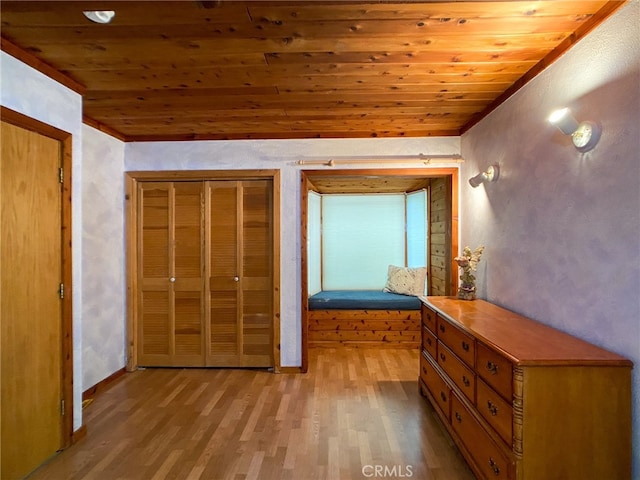 unfurnished bedroom featuring wood ceiling and wood-type flooring