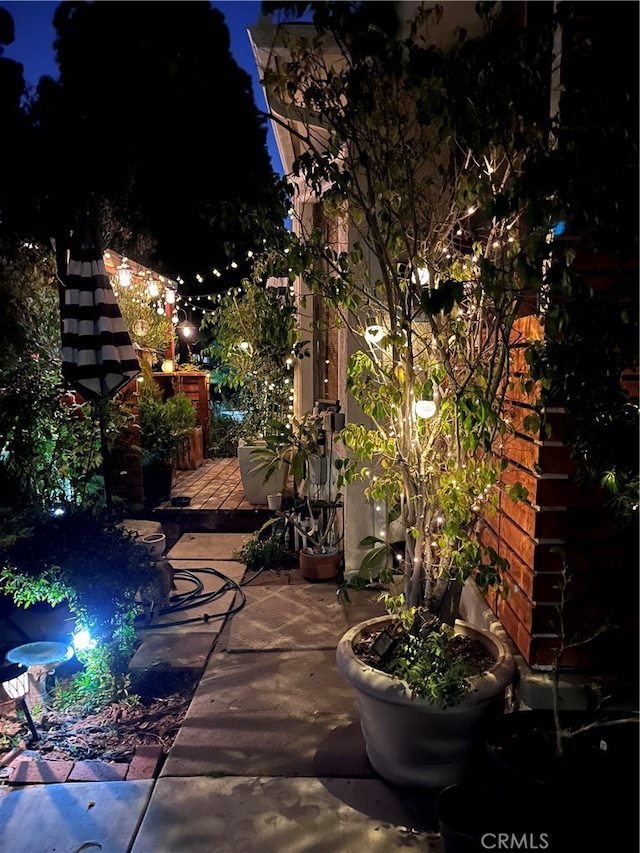 view of patio at twilight