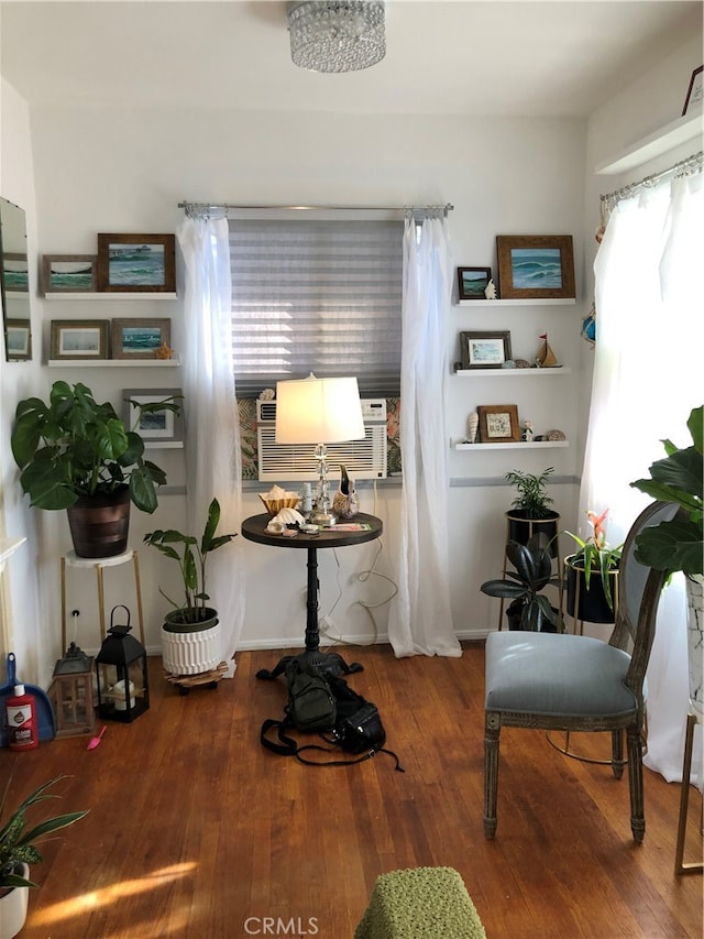 living area featuring hardwood / wood-style floors