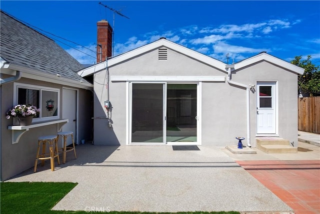 back of house featuring a patio area