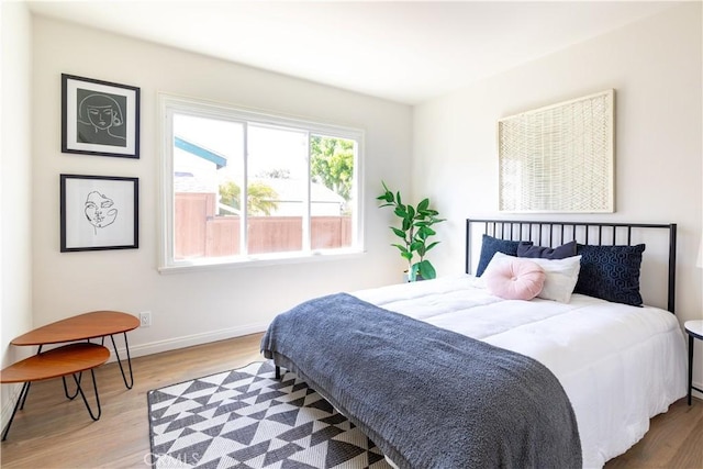 bedroom featuring light wood-type flooring