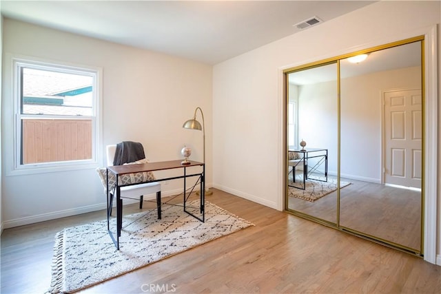 office area with light wood-type flooring