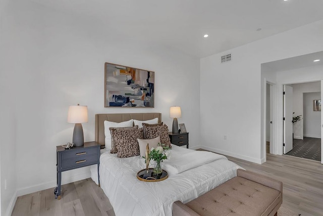 bedroom with light wood-type flooring