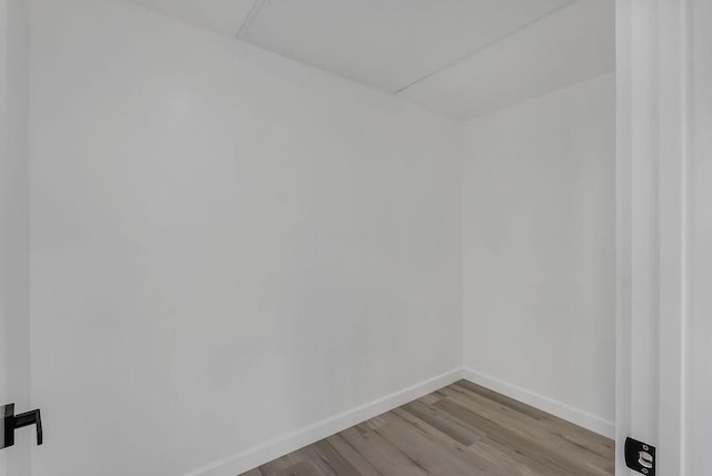 unfurnished room with light hardwood / wood-style floors