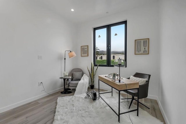 home office with light wood-type flooring