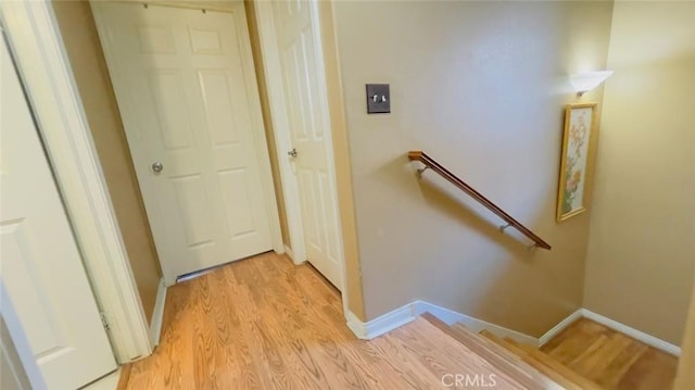 hallway featuring light hardwood / wood-style flooring