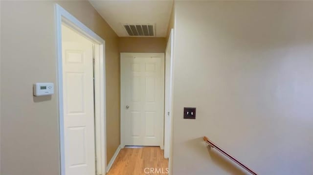 hallway featuring light hardwood / wood-style floors