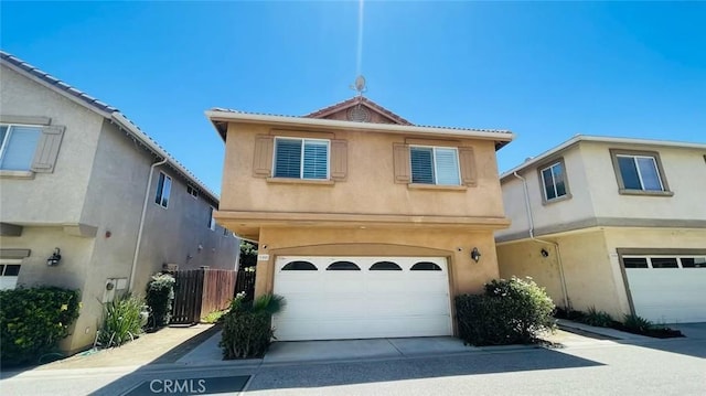 view of front of property with a garage