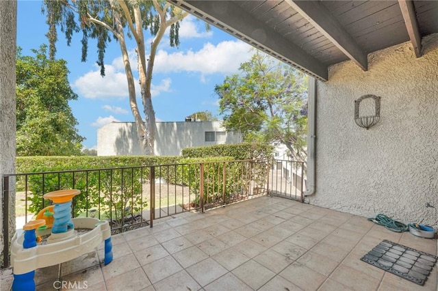 view of patio / terrace with a balcony