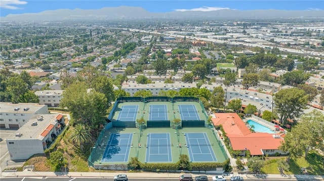 birds eye view of property with a mountain view