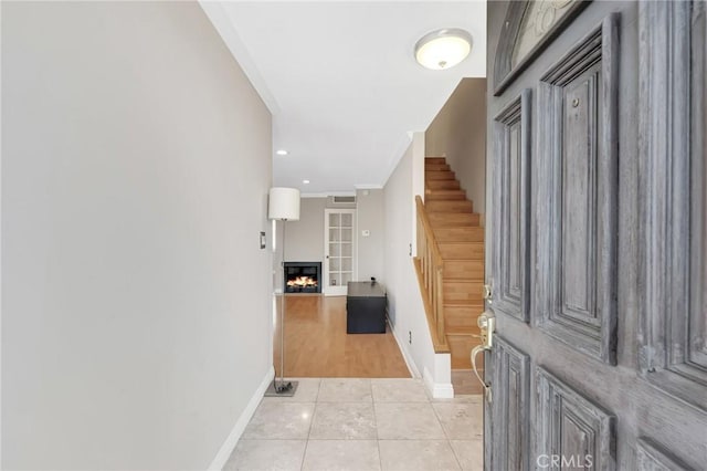 entrance foyer featuring light tile patterned flooring