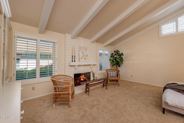 living area with lofted ceiling with beams, baseboards, a lit fireplace, and carpet flooring