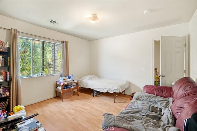 bedroom featuring hardwood / wood-style floors