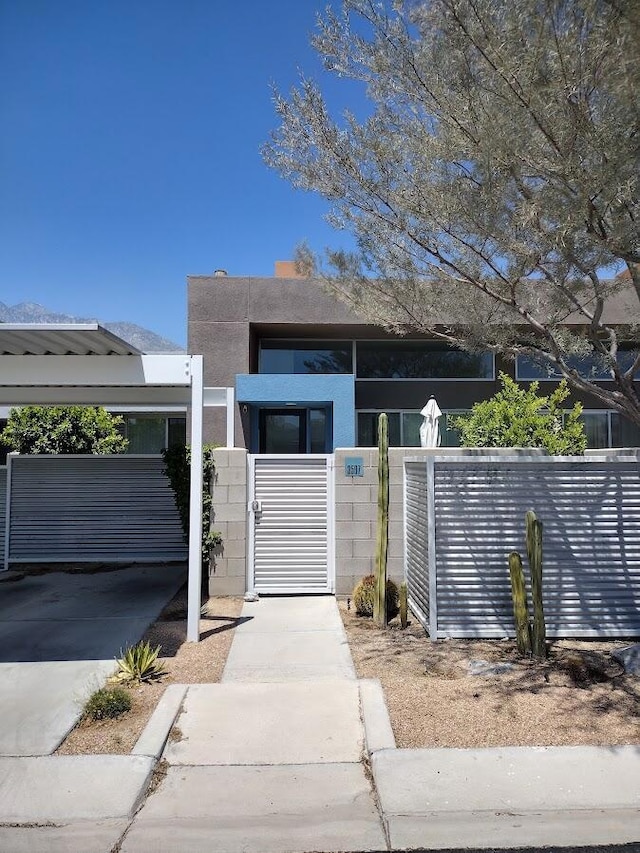 view of front of property with a carport