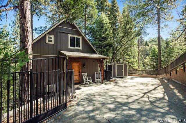 view of front of property with a storage unit