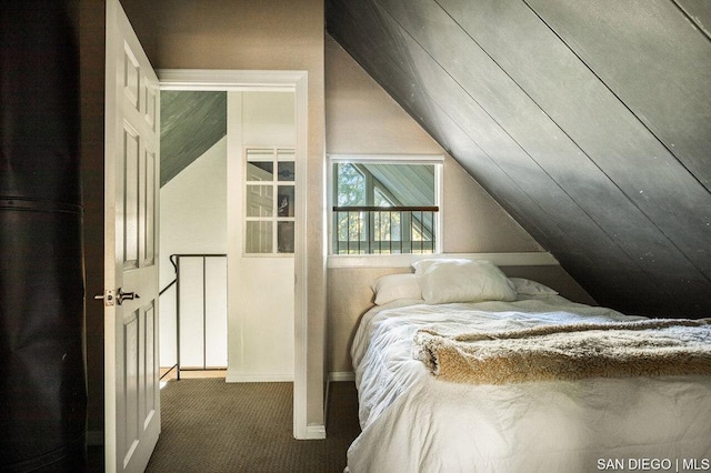 unfurnished bedroom featuring dark colored carpet