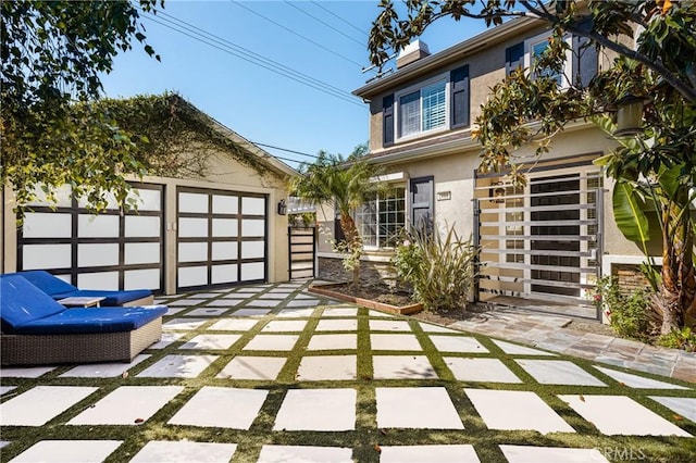 view of front of property featuring a garage