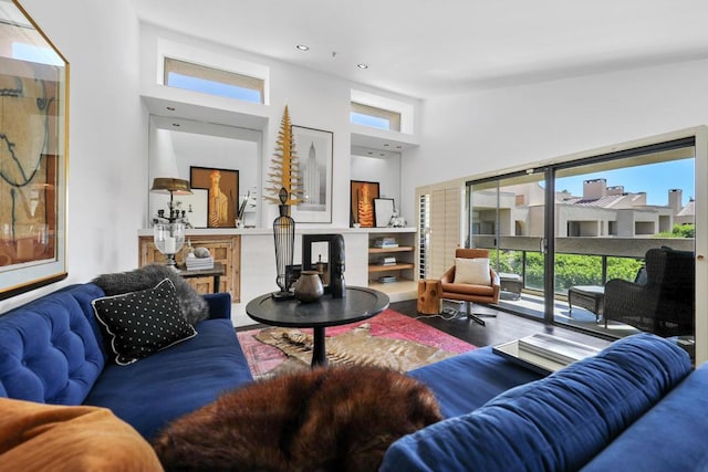 living room with a towering ceiling