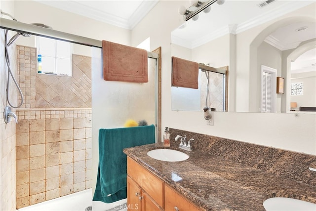 bathroom with vanity and ornamental molding