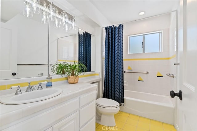 full bathroom featuring tile patterned flooring, vanity, toilet, and shower / bathtub combination with curtain