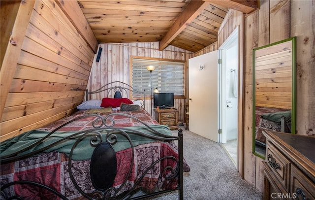 bedroom with lofted ceiling with beams, wood ceiling, wood walls, and light carpet