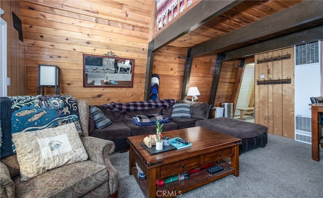 living room with wood ceiling, carpet flooring, and beamed ceiling