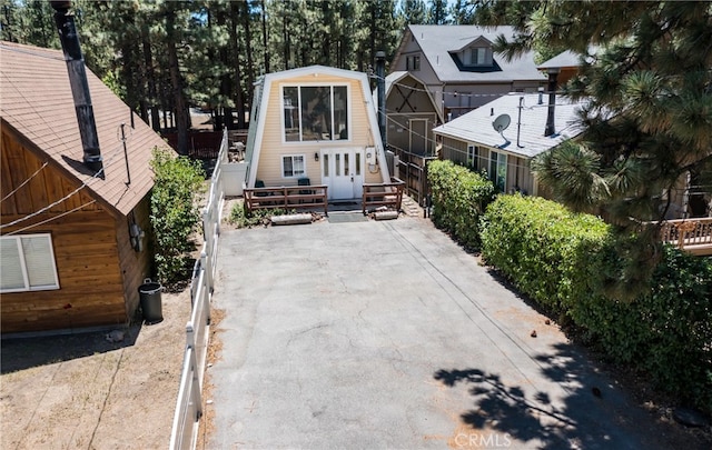 view of front of property with a sunroom