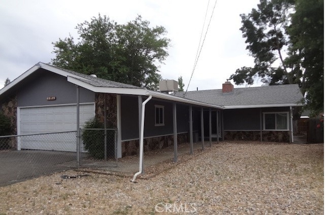 ranch-style home with a garage