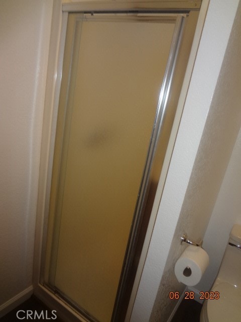 details with walk in shower and toilet