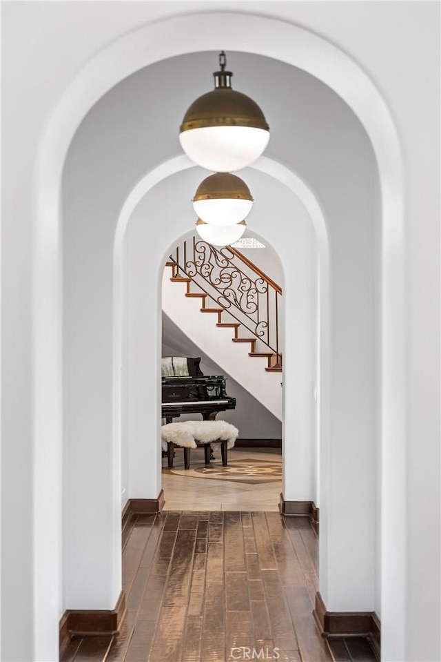 hallway with dark hardwood / wood-style floors