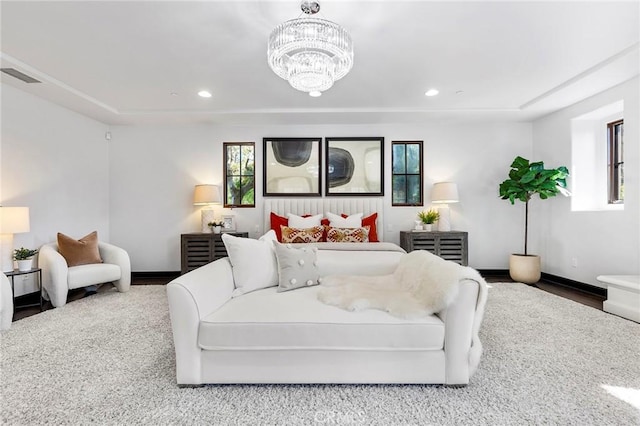 bedroom featuring an inviting chandelier