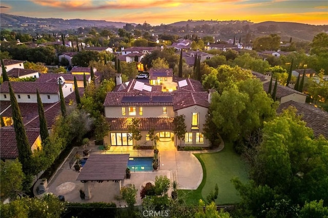 view of aerial view at dusk