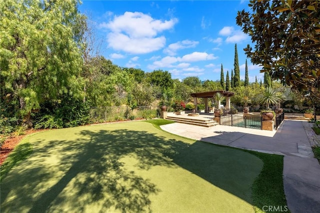 view of community with a patio area, a pool, and a pergola