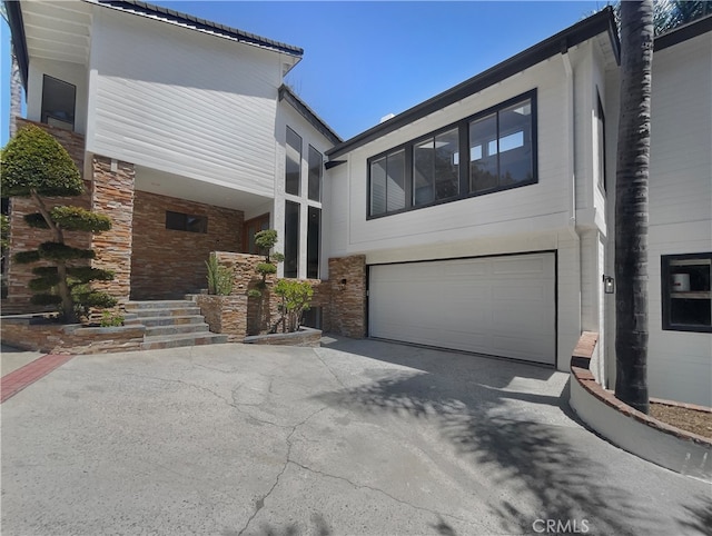 view of front of home with a garage