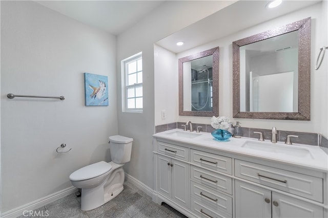 bathroom with walk in shower, tile patterned flooring, vanity, and toilet