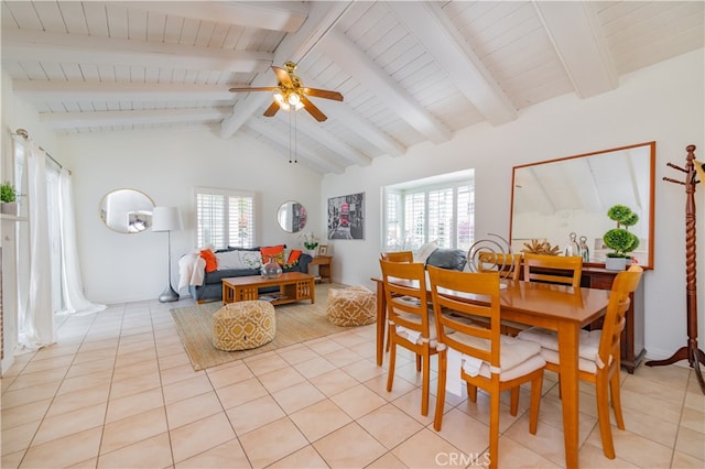 tiled dining room featuring lofted ceiling with beams and ceiling fan