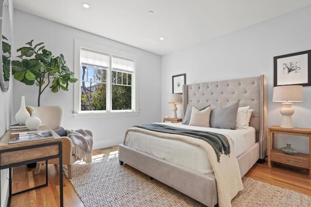 bedroom featuring light hardwood / wood-style floors