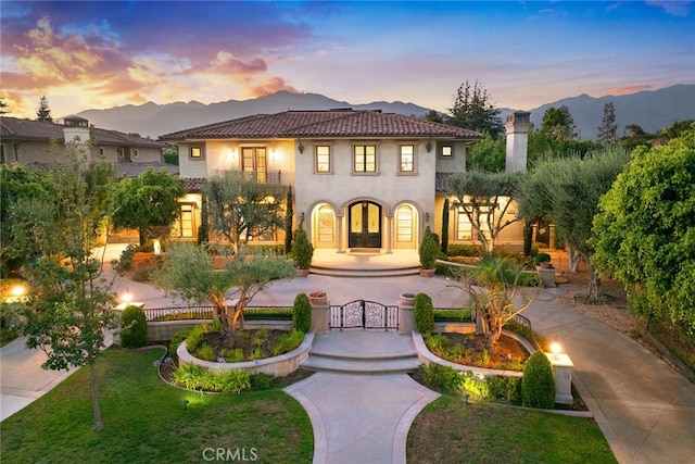 view of front of house featuring a mountain view