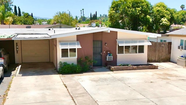 ranch-style home with a garage