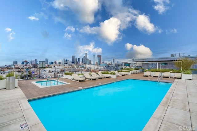 view of swimming pool with a patio area