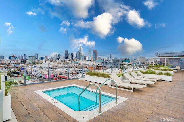 view of pool featuring a community hot tub