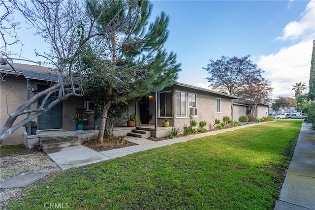 view of front of property with a front yard