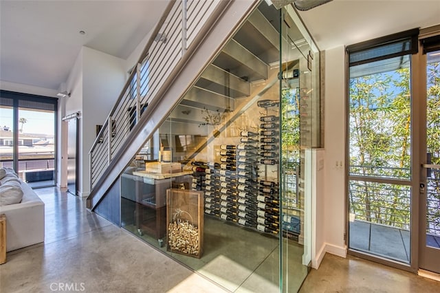 wine room featuring concrete floors