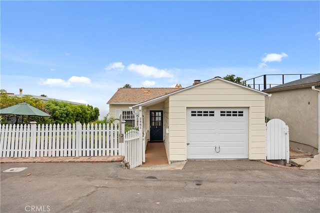 ranch-style home with a garage