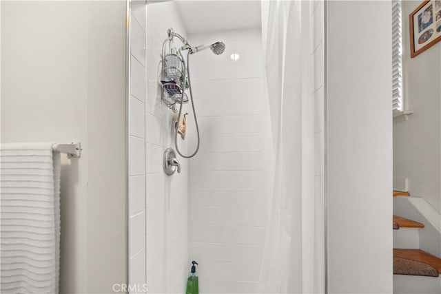 bathroom featuring walk in shower