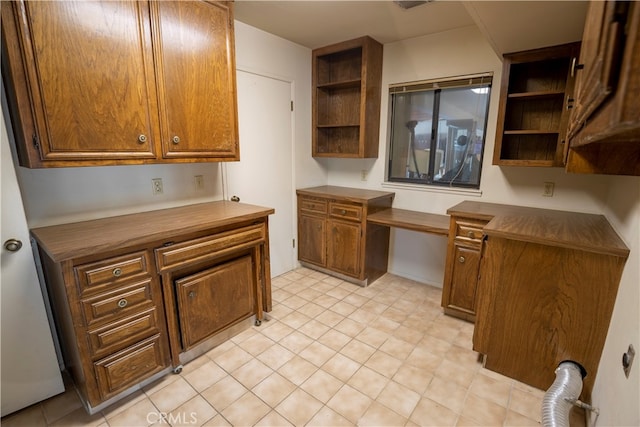 kitchen featuring built in desk