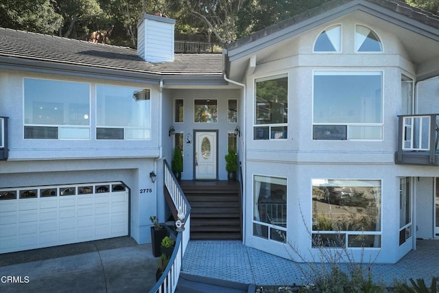 view of front of property with a garage