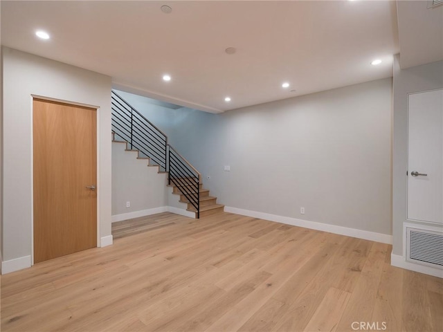 3100 Tennyson Pl, Hermosa Beach, CA 90254 - unfurnished living room featuring stairs, baseboards, light wood-type flooring, and recessed lighting